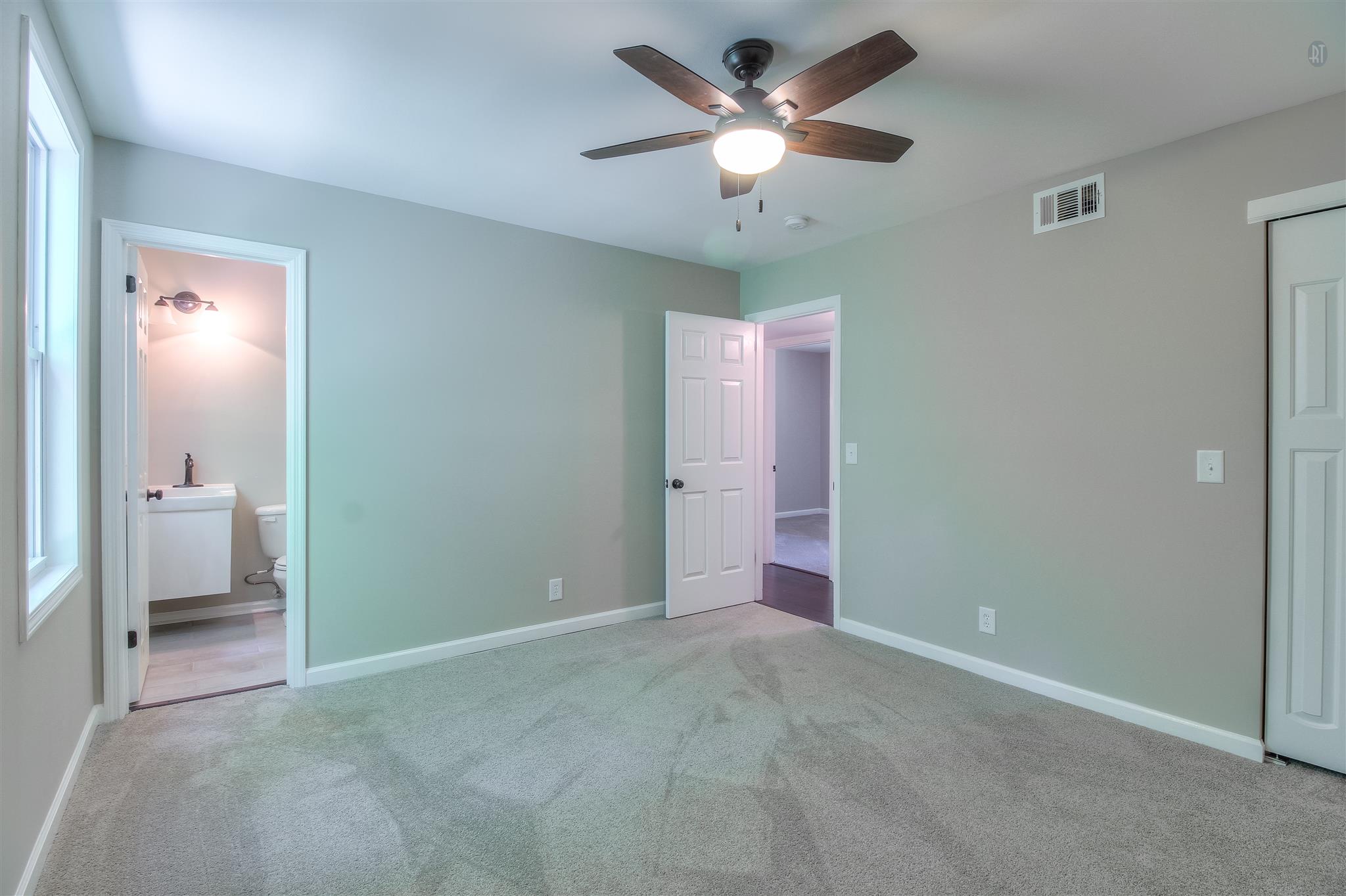 304 Warrior Road Madison, TN 37115 - Photo 9 of 16 The master suite features a ceiling fan and an attached half bath.