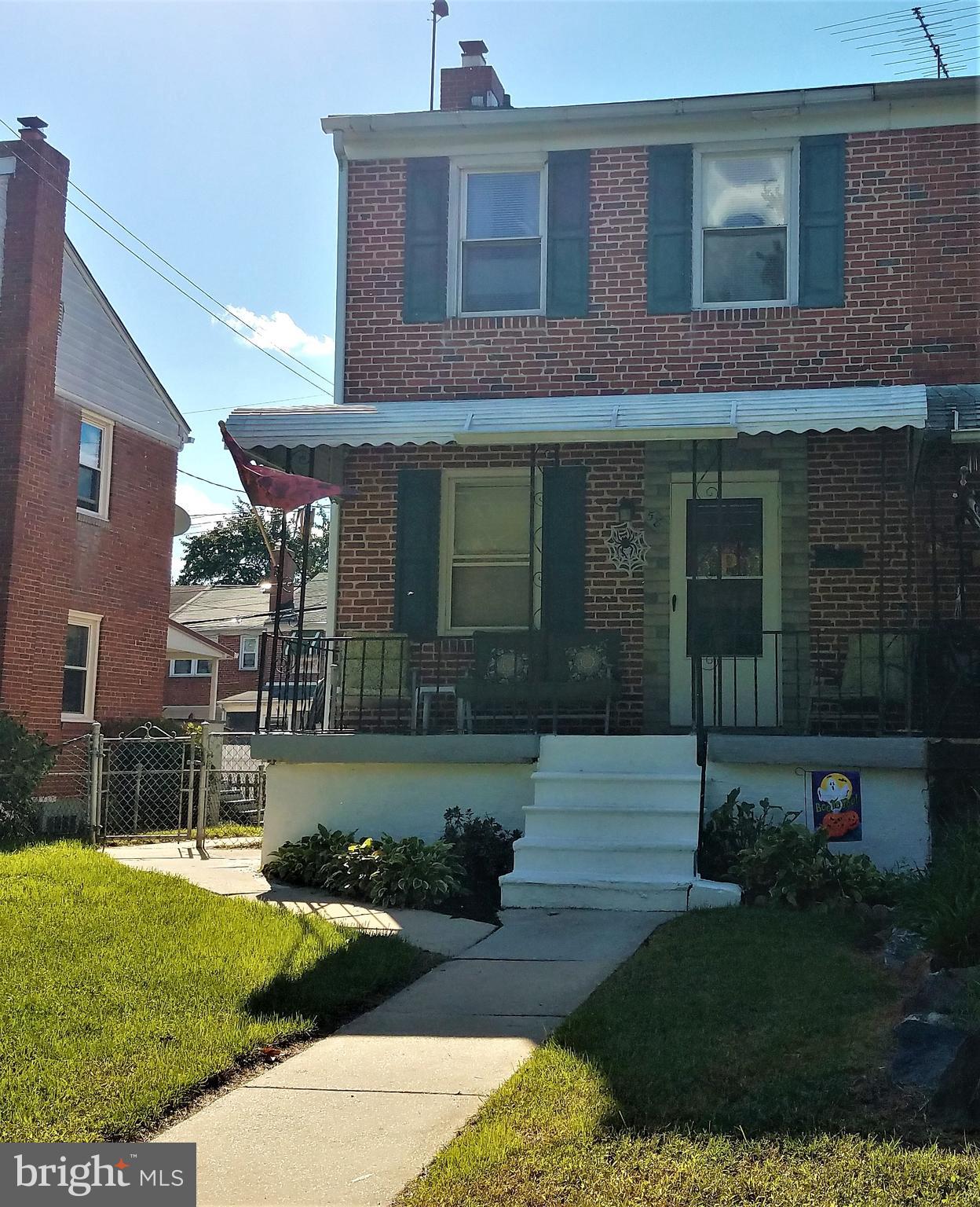 58 Berkshire Road Baltimore, MD 21221 - Photo 2 of 41 a front view of a house with garden