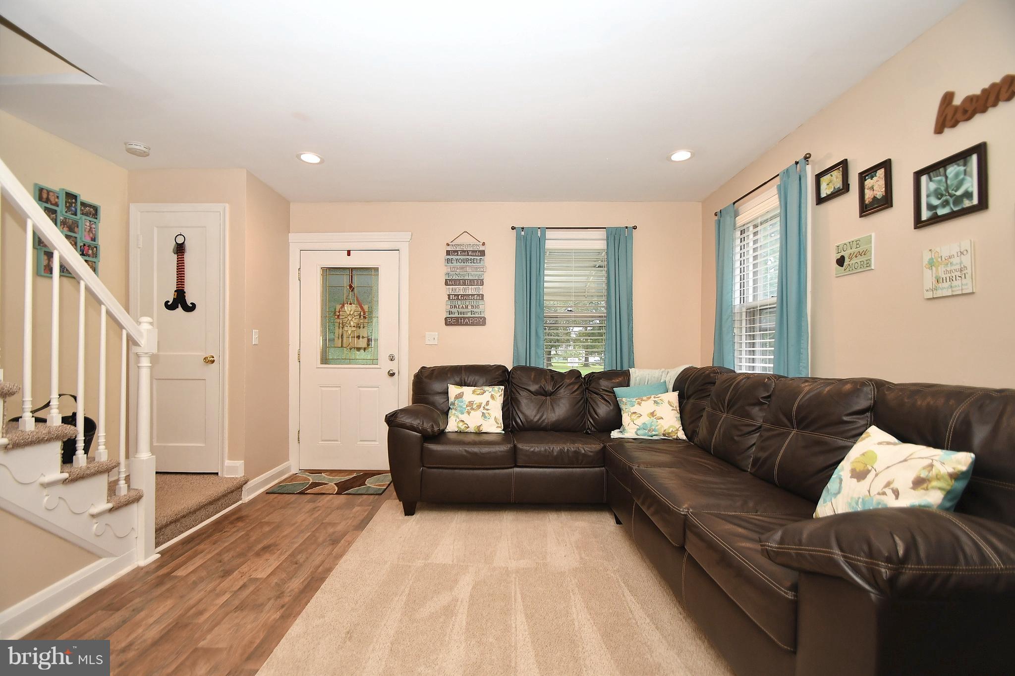 58 Berkshire Road Baltimore, MD 21221 - Photo 11 of 41 a living room with furniture and a couch