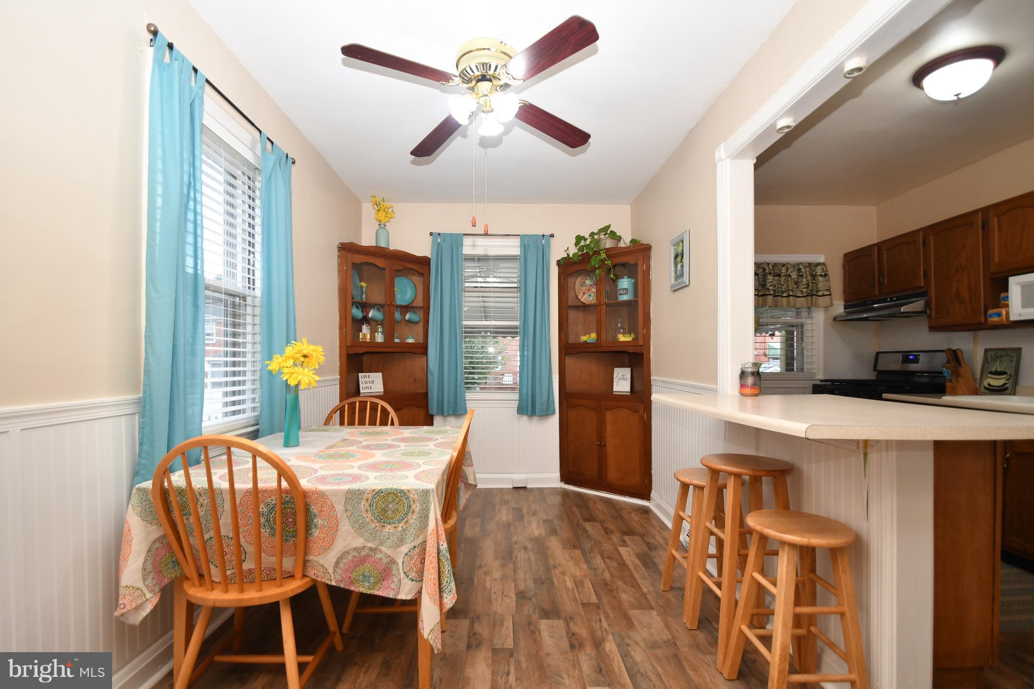 58 Berkshire Road Baltimore, MD 21221 - Photo 13 of 41 a dining room with furniture and window