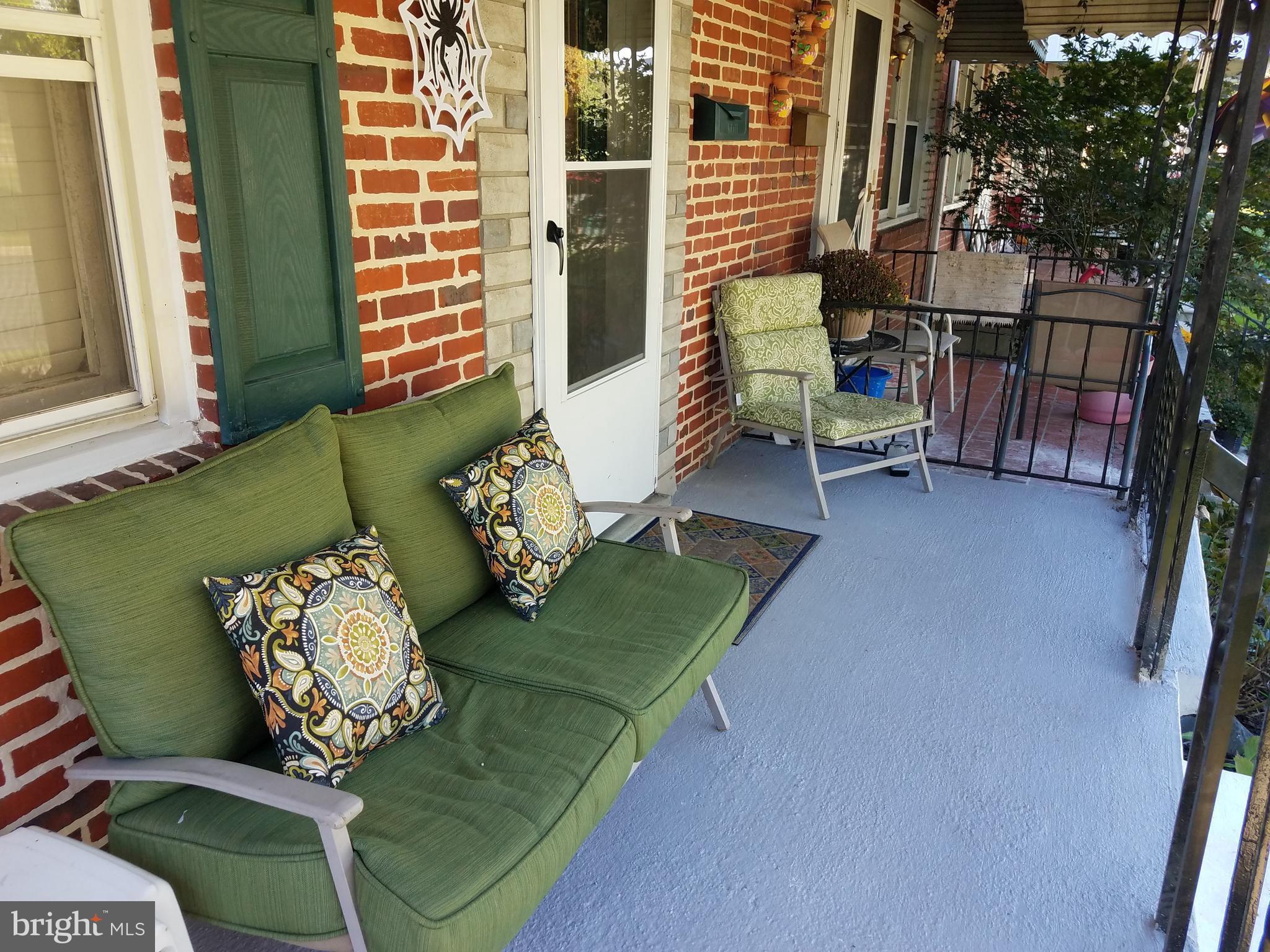 58 Berkshire Road Baltimore, MD 21221 - Photo 3 of 41 a backyard of a house with outdoor seating