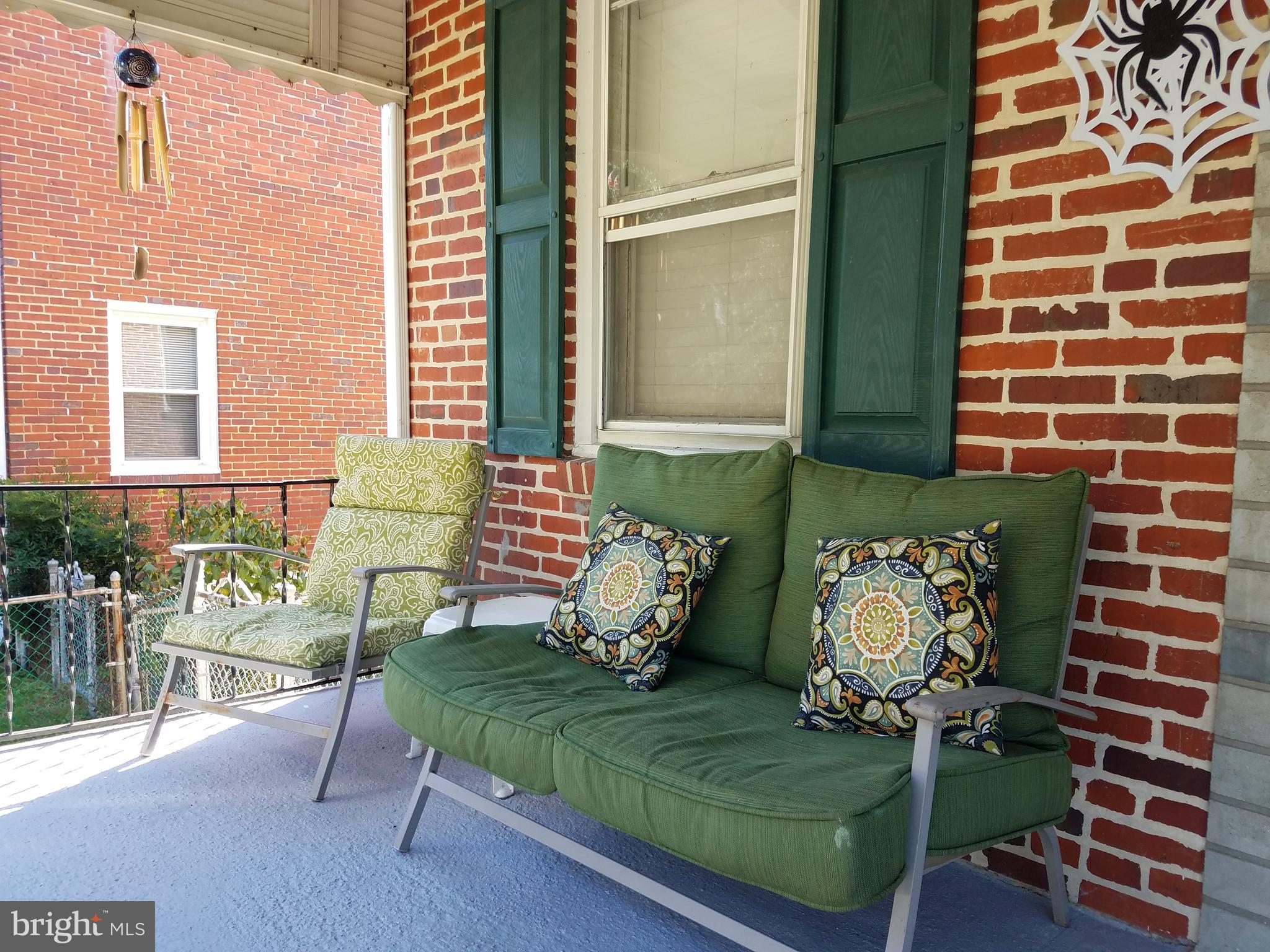 58 Berkshire Road Baltimore, MD 21221 - Photo 4 of 41 a building outdoor space with patio furniture