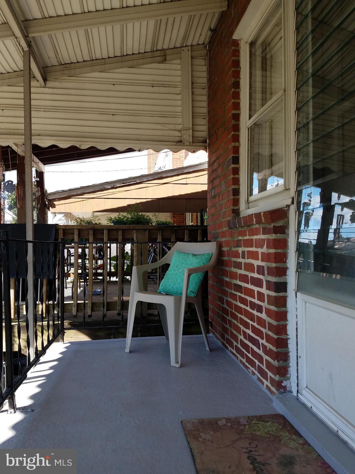 58 Berkshire Road Baltimore, MD 21221 - Photo 35 of 41 a view of a chairs and table in a patio