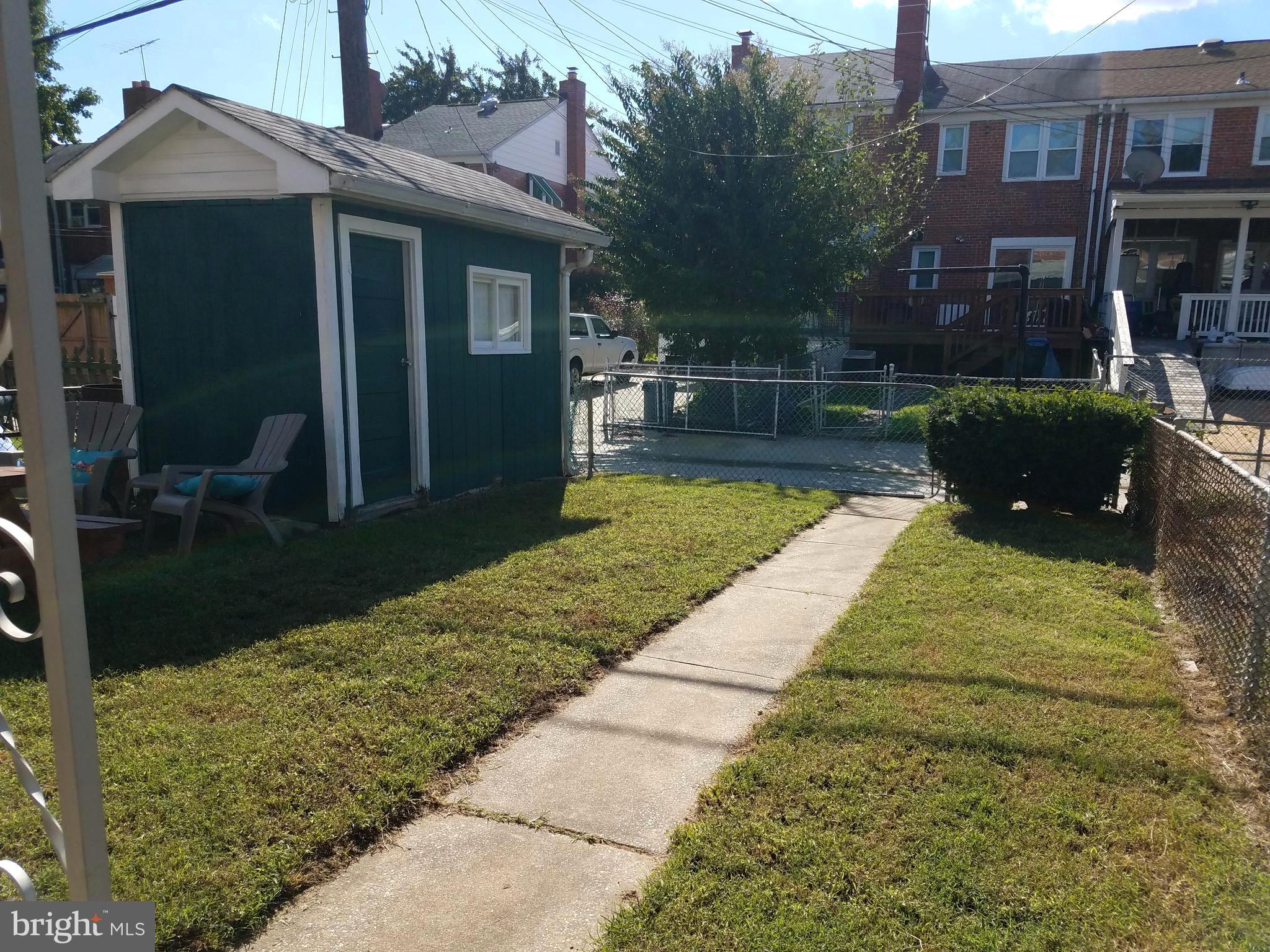 58 Berkshire Road Baltimore, MD 21221 - Photo 39 of 41 a view of a house with backyard and sitting area