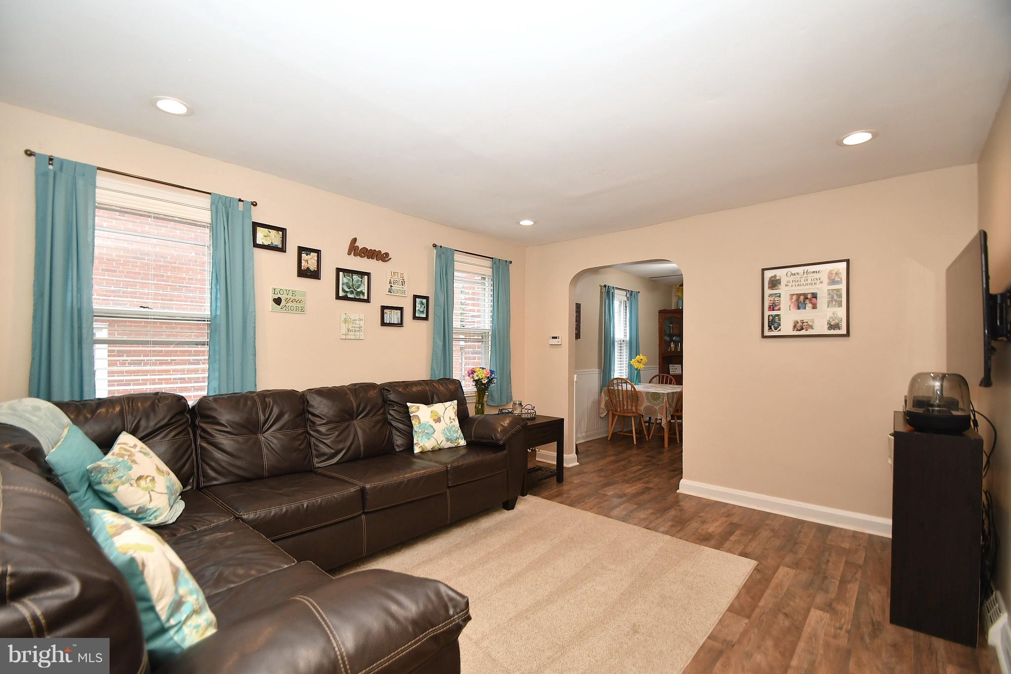 58 Berkshire Road Baltimore, MD 21221 - Photo 7 of 41 a living room with furniture and a couch