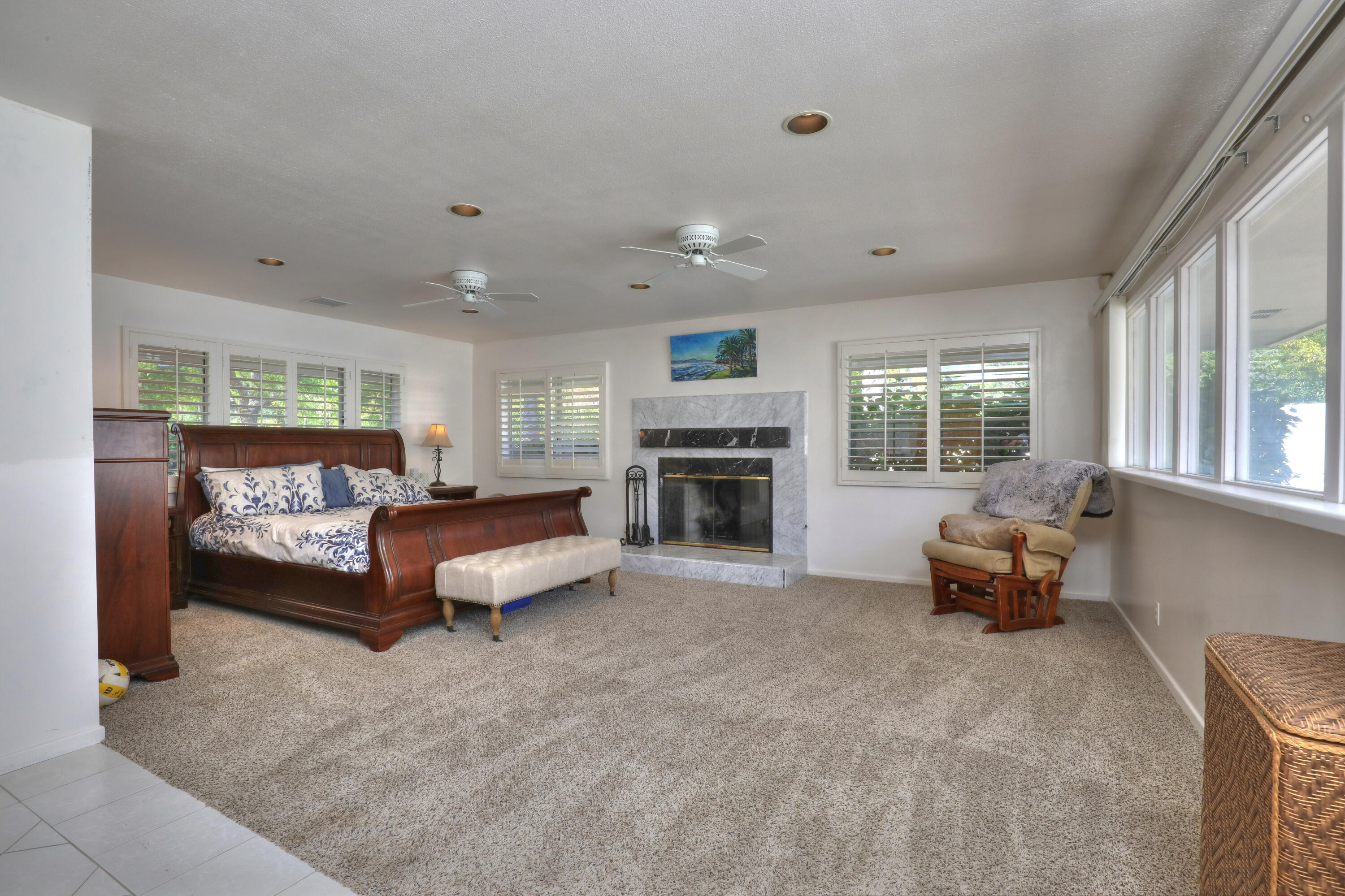 4620 Via Rubi Santa Barbara, CA 93105 - Photo 12 of 18 a living room with furniture and a fireplace