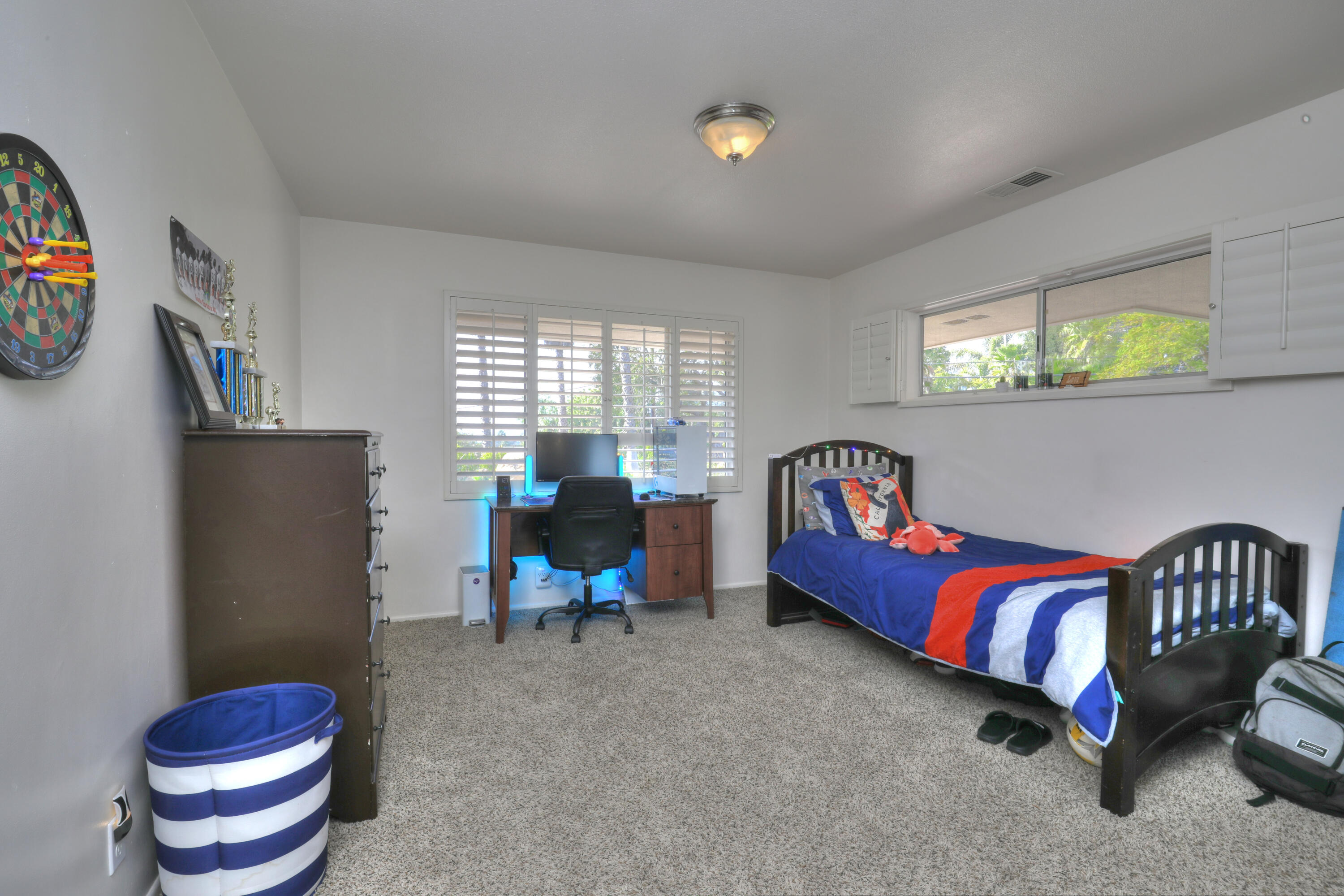 4620 Via Rubi Santa Barbara, CA 93105 - Photo 14 of 18 a bedroom with furniture and a window