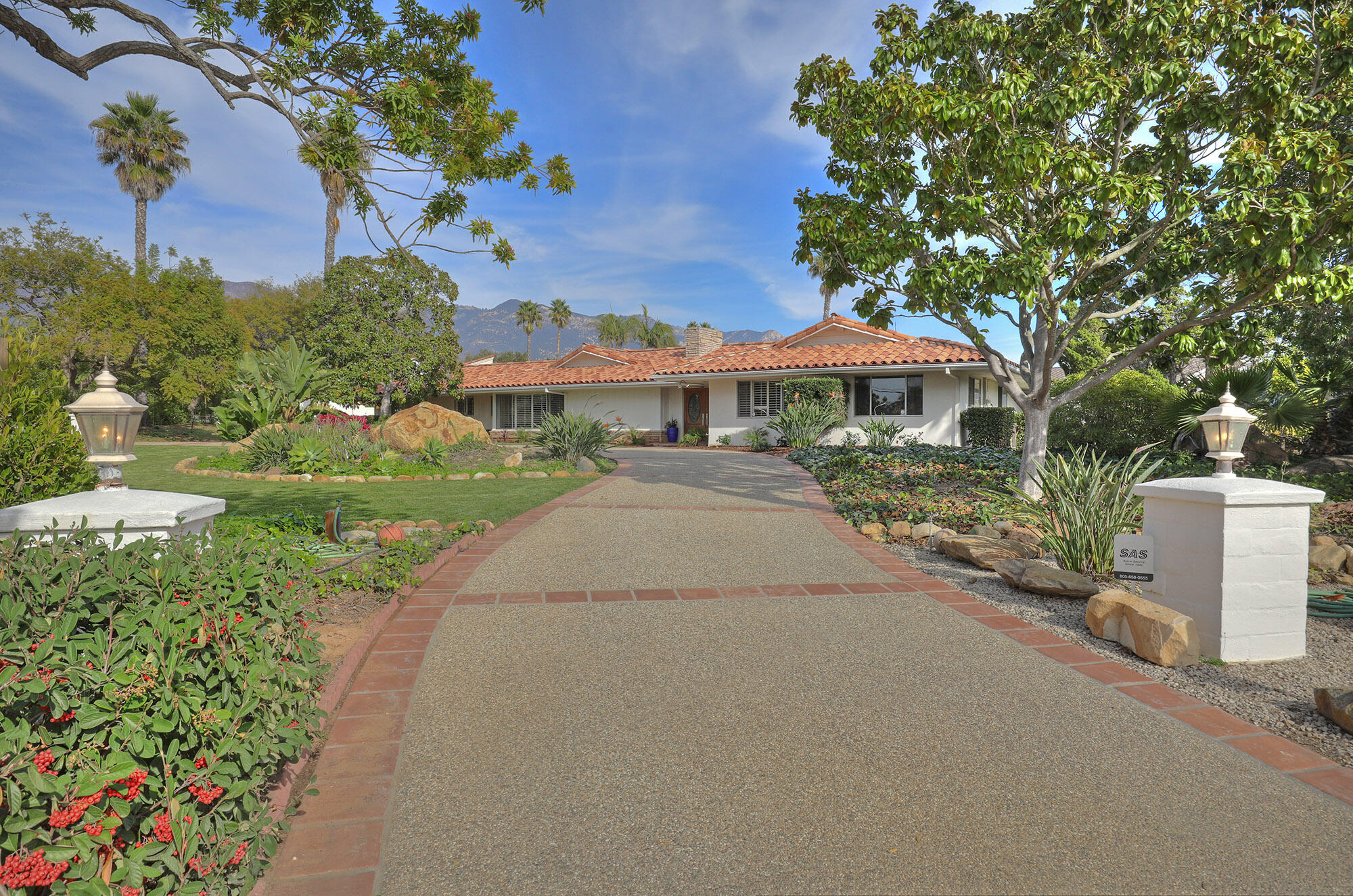 4620 Via Rubi Santa Barbara, CA 93105 - Photo 2 of 18 a view of a house with a yard and potted plants