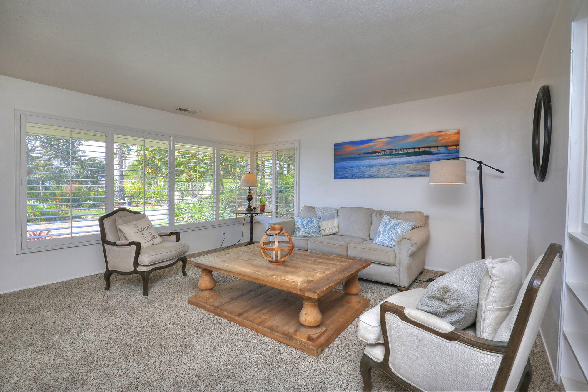 4620 Via Rubi Santa Barbara, CA 93105 - Photo 4 of 18 a living room with furniture and a floor to ceiling window