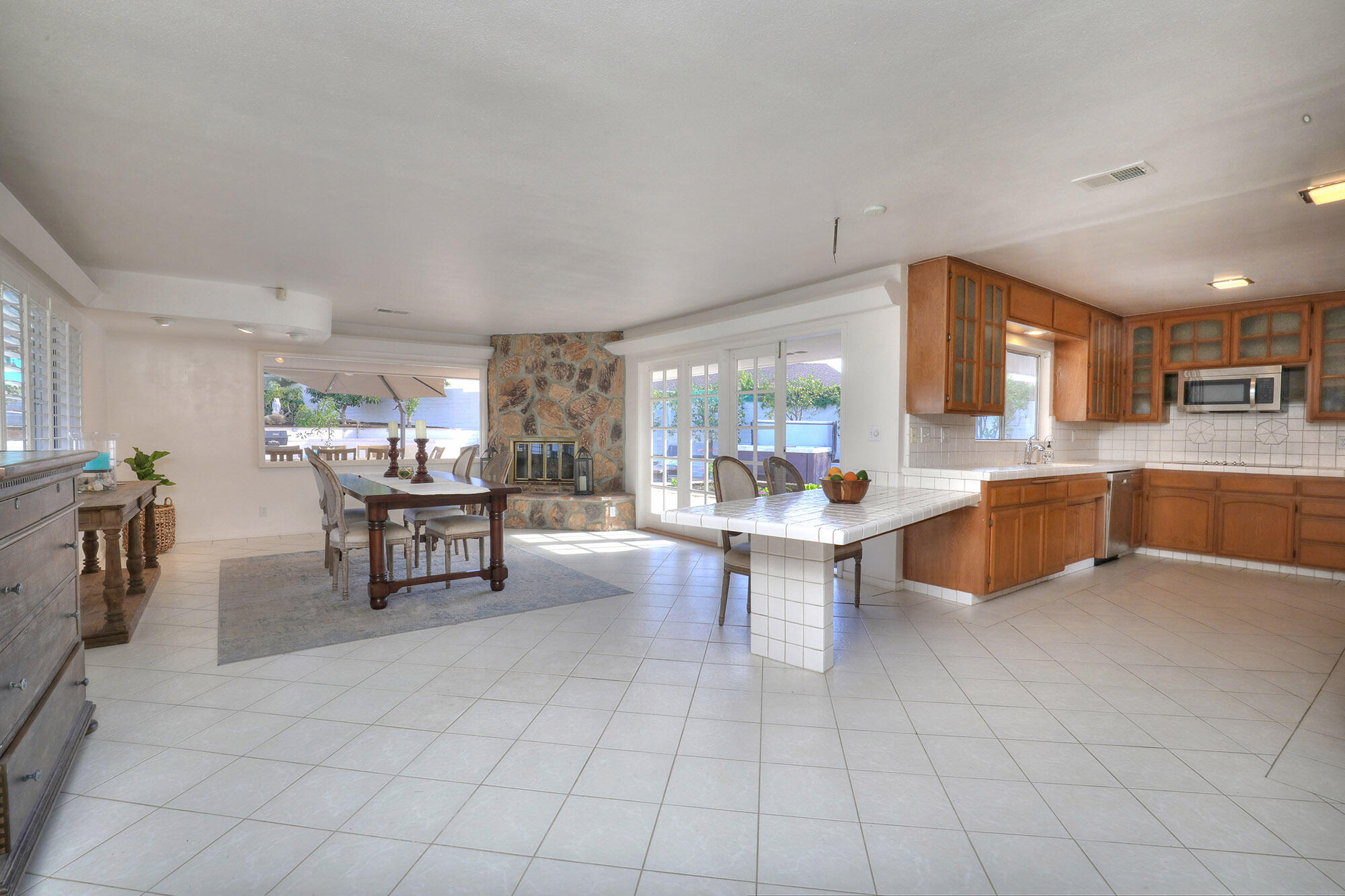4620 Via Rubi Santa Barbara, CA 93105 - Photo 5 of 18 a large kitchen with a table and chairs