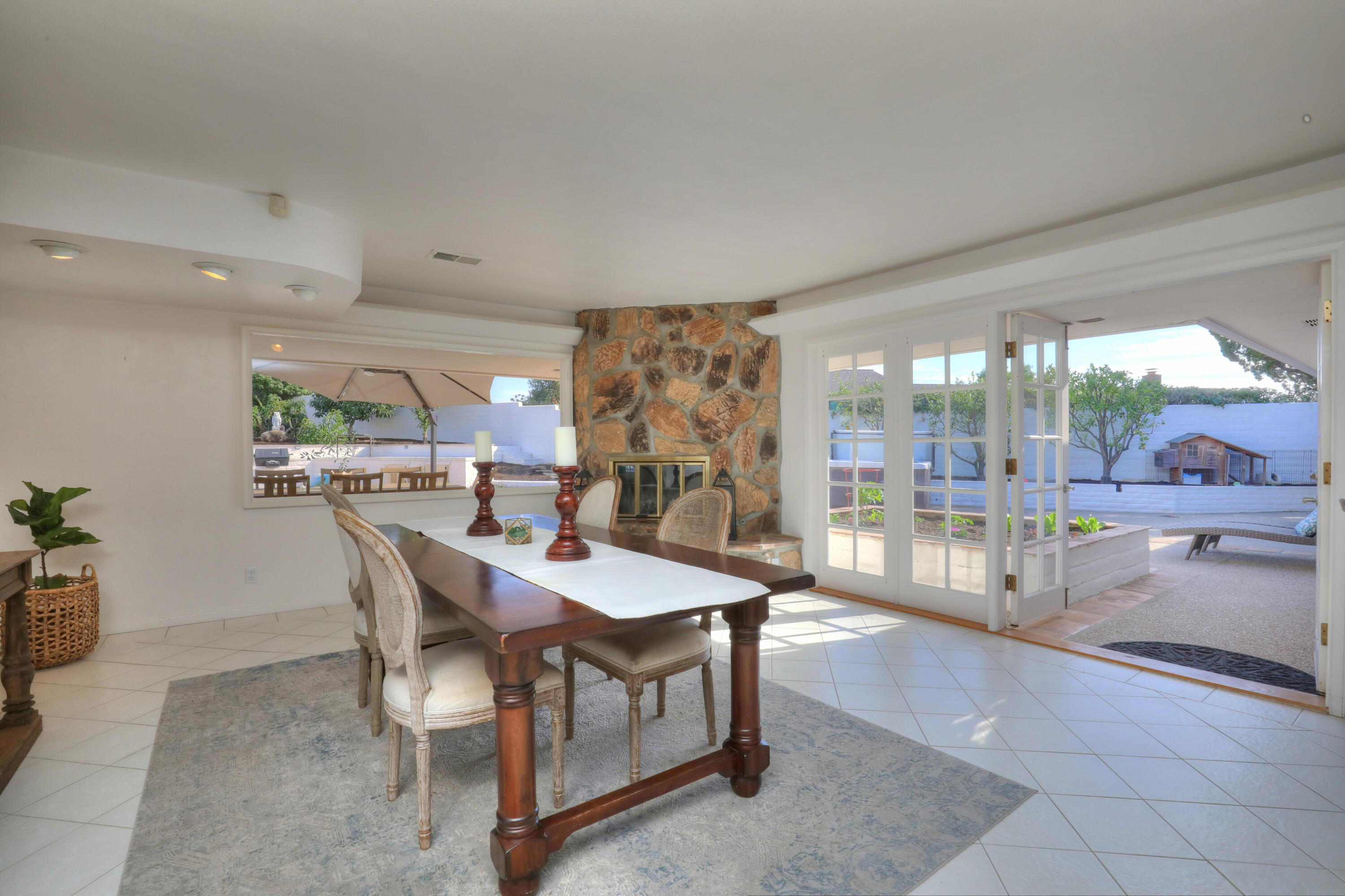 4620 Via Rubi Santa Barbara, CA 93105 - Photo 10 of 18 a dining hall with stainless steel appliances a sink and view of living room