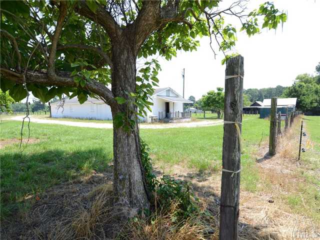 156 Bear Road Dunn, NC 28334 - Photo 1 of 17 Great Opportunity with the 8+ acre tract of land right off HWY 242 in Benson. 5 Miles outside the city limits.... Special Use Permit Zoning to allow for Businesses - and partially zoned AG for Farming, pastures, horses!