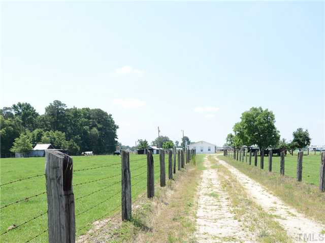 156 Bear Road Dunn, NC 28334 - Photo 11 of 17 Path with 2 fenced pastures