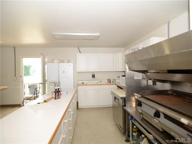 156 Bear Road Dunn, NC 28334 - Photo 6 of 17 WOW look at all the cabinetry and stainless steel equipment