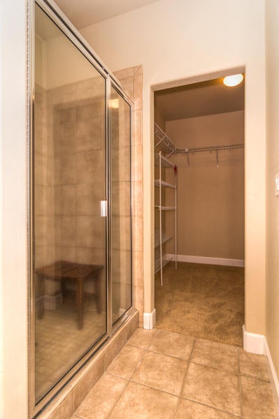 2159 Southwest 36th Court Redmond, OR 97756 - Photo 27 of 44 Tiled shower is on left side and enclosed W/C is on the right.