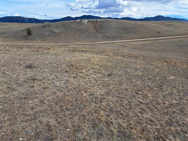 a view of beach and a mountain