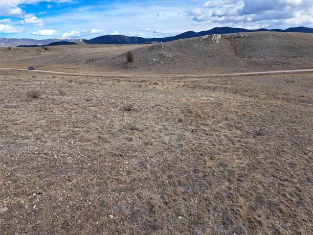 a view of an outdoor space and mountain view
