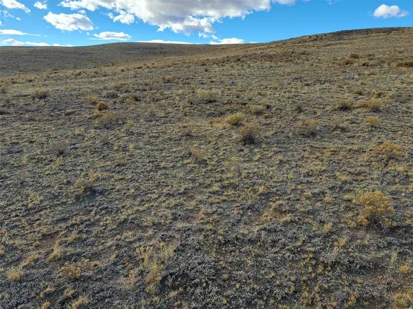 a view of a space with a mountain