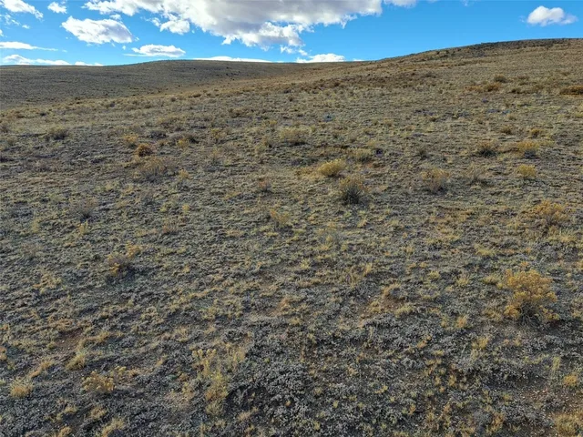 a view of a space with a mountain