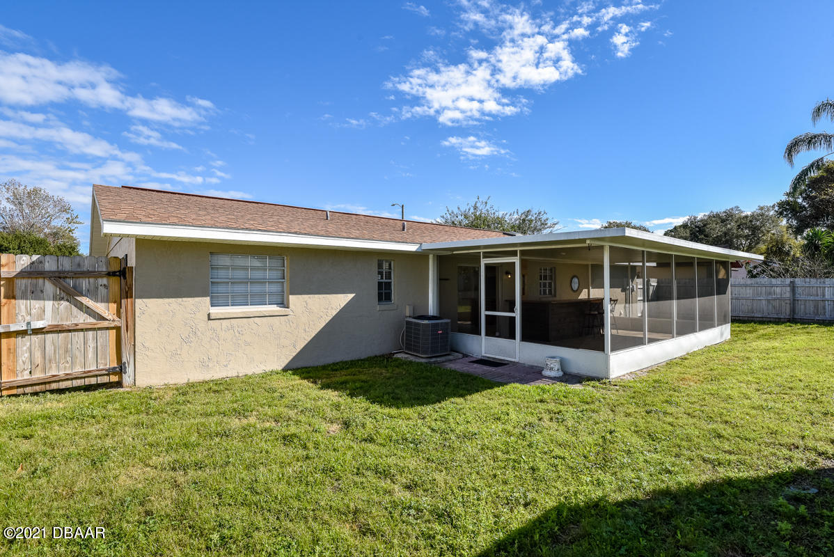 25 Tula Drive Port Orange, FL 32129 - Photo 17 of 49 a view of a house with backyard porch and sitting area