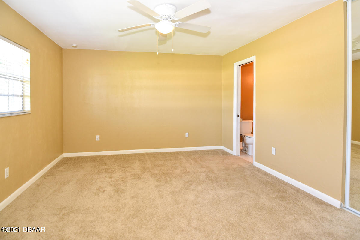 25 Tula Drive Port Orange, FL 32129 - Photo 28 of 49 an empty room with a window
