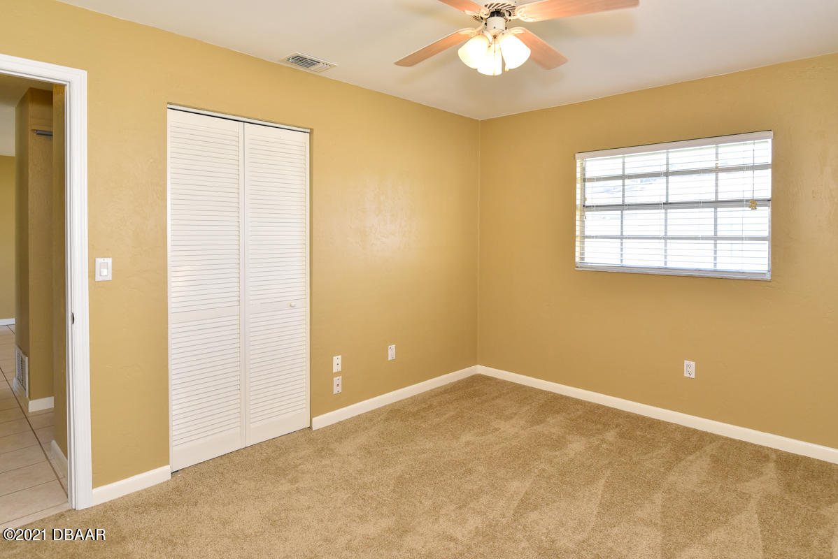 25 Tula Drive Port Orange, FL 32129 - Photo 40 of 49 a view of an empty room with a window