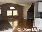 2175 Spruce Street Wantagh, NY 11793 - Photo 4 of 8 a view of a hallway with a window