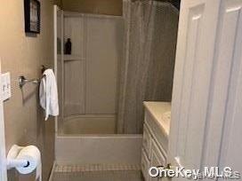 2175 Spruce Street Wantagh, NY 11793 - Photo 8 of 8 a bathroom with a shower