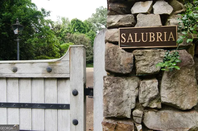 a view of outdoor space with signage and flags