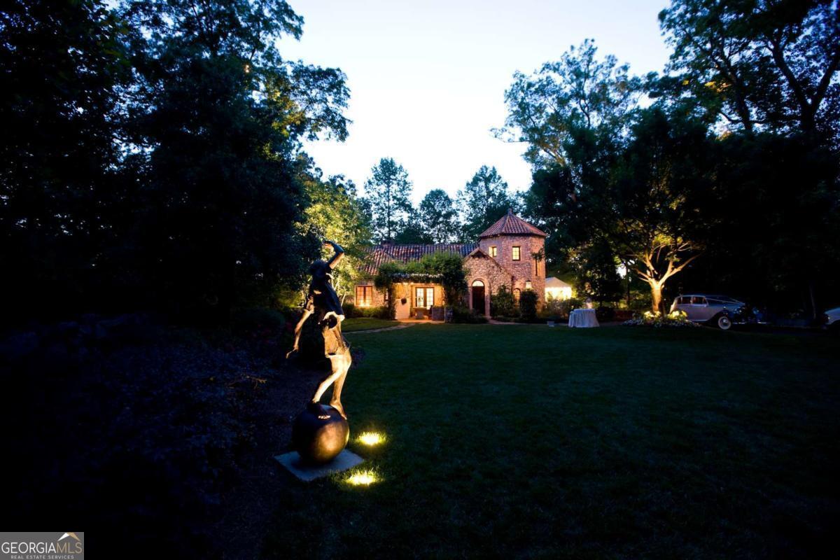 2100 West Wesley Road Northwest Atlanta, GA 30327 - Photo 18 of 53 a view of a backyard