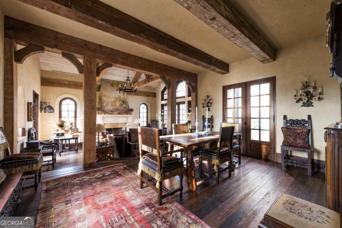 2100 West Wesley Road Northwest Atlanta, GA 30327 - Photo 22 of 53 a view of a dining room with furniture window and wooden floor