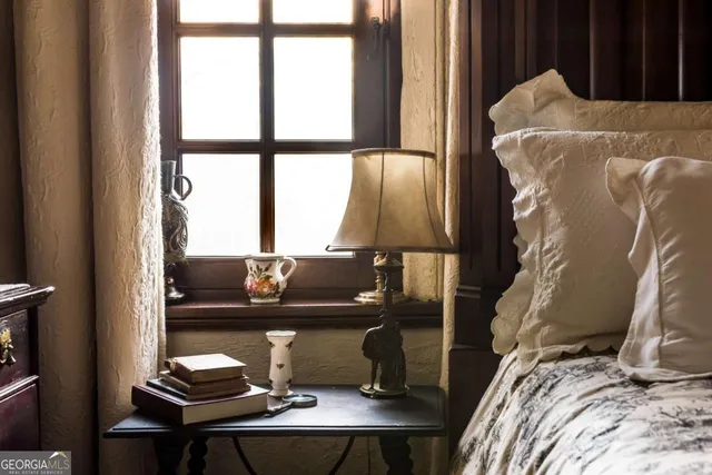 a view of a workspace with furniture and entryway