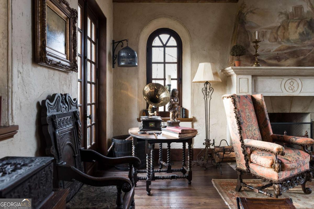 2100 West Wesley Road Northwest Atlanta, GA 30327 - Photo 31 of 53 a view of a workspace with furniture and entryway