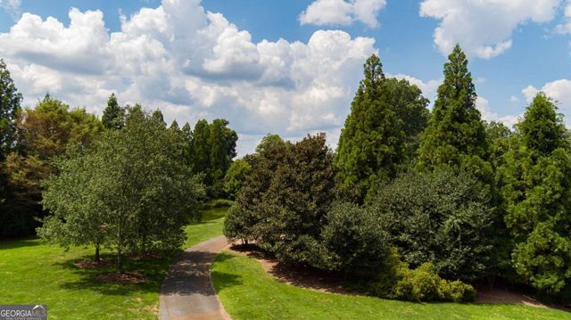a view of a city and green space