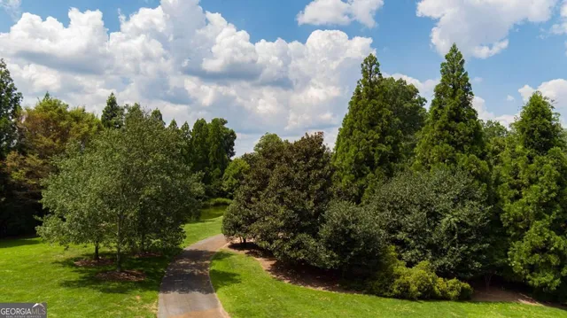 a view of a city and green space
