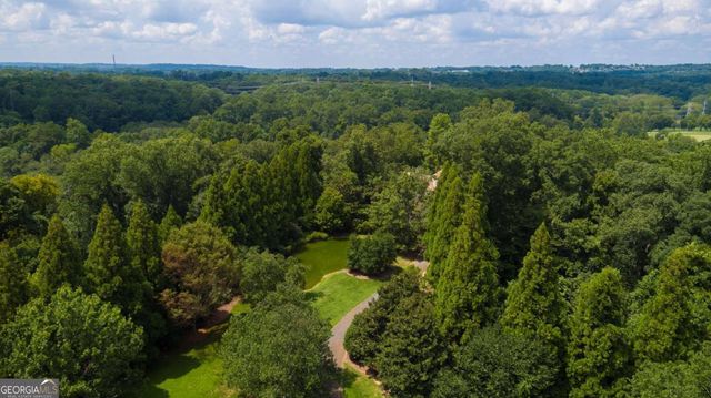 a view of a fountain in a backyard