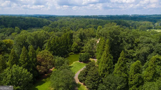 a view of a fountain in a backyard