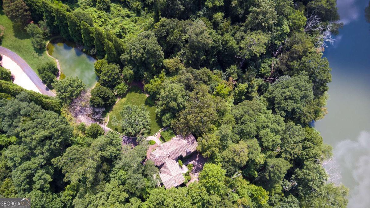 2100 West Wesley Road Northwest Atlanta, GA 30327 - Photo 45 of 53 an aerial view of a house with a yard
