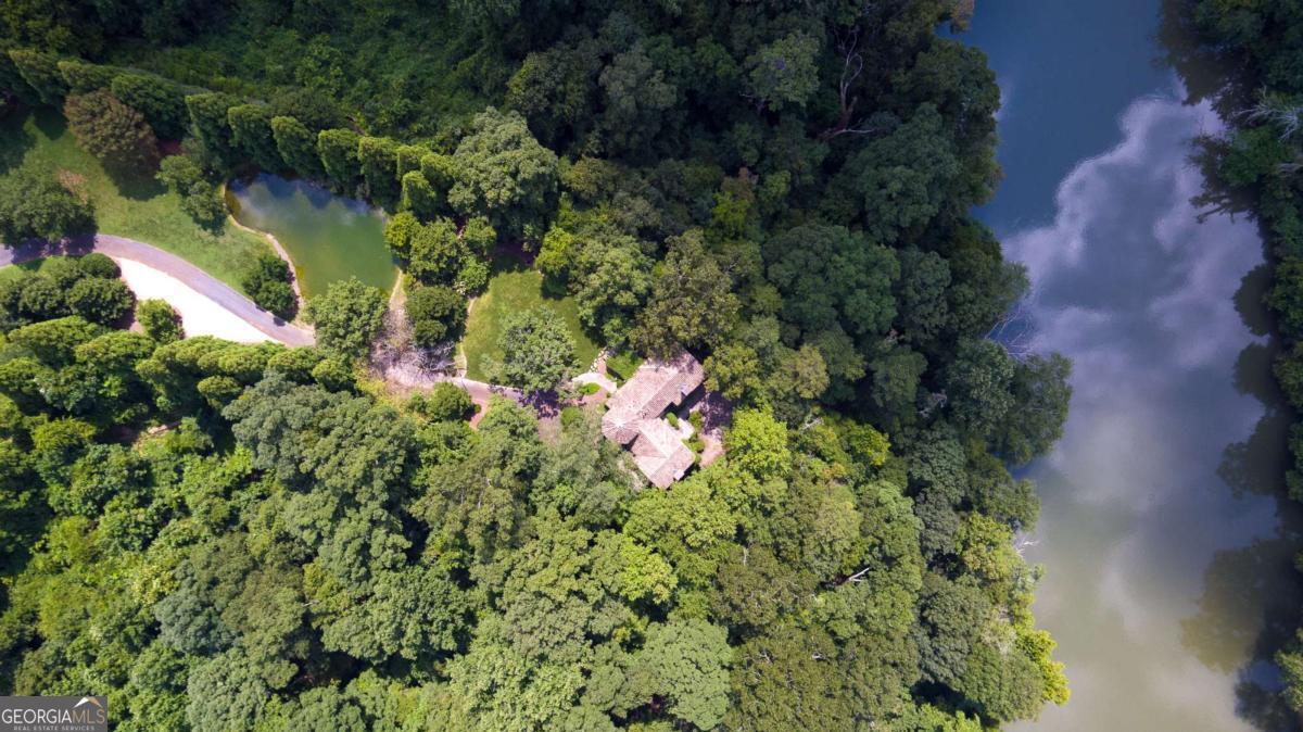 2100 West Wesley Road Northwest Atlanta, GA 30327 - Photo 46 of 53 a view of a garden with a house