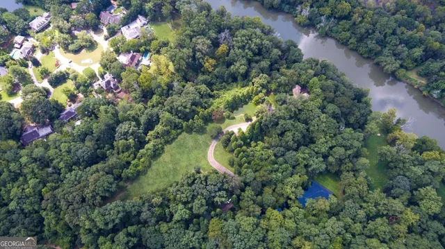 a view of a house with a tree