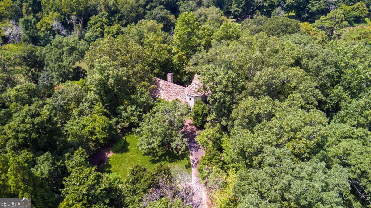 2100 West Wesley Road Northwest Atlanta, GA 30327 - Photo 50 of 53 a view of a house with a tree