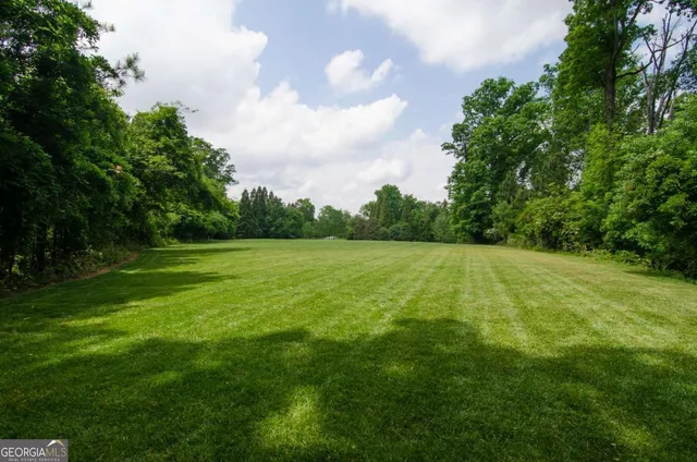 a view of a golf course with a garden
