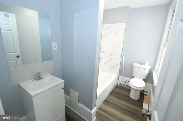 a bathroom with a sink and a toilet