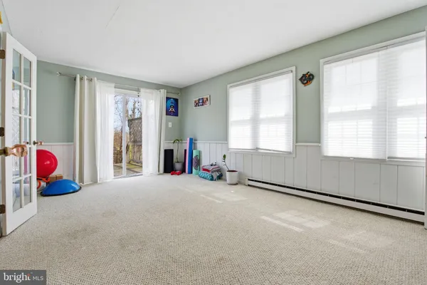 an empty room with windows