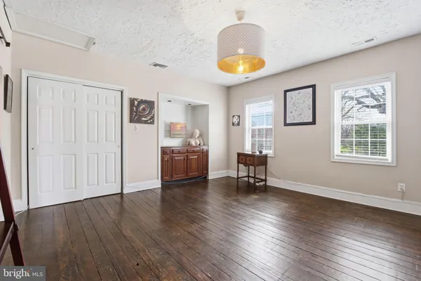 a view of livingroom with furniture and a window