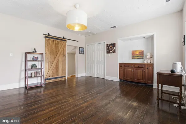 a view of livingroom with furniture and wooden floor