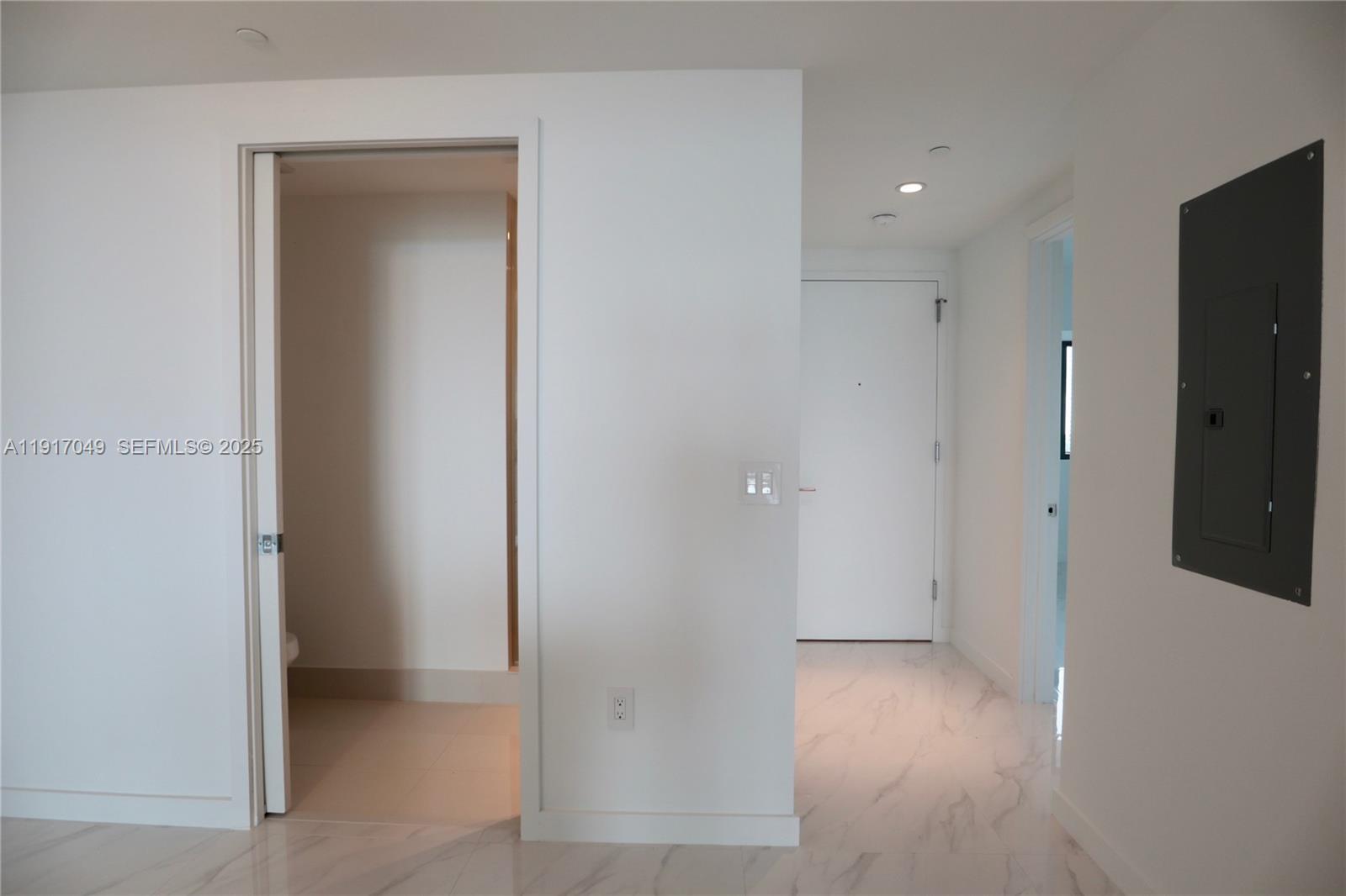 650 Northeast 32nd Street, Unit 1207 Miami, FL 33137 - Photo 14 of 30 an empty room with wooden floor