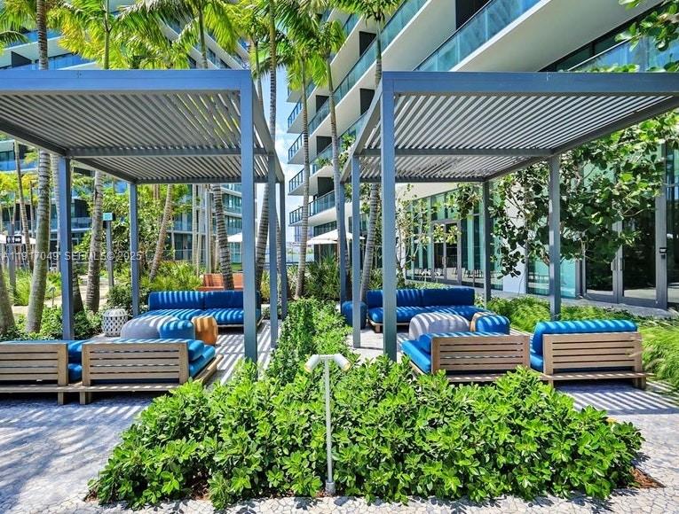 650 Northeast 32nd Street, Unit 1207 Miami, FL 33137 - Photo 22 of 30 a garden view with a seating space