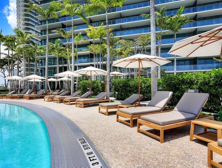 650 Northeast 32nd Street, Unit 1207 Miami, FL 33137 - Photo 23 of 30 a outdoor space with swimming pool and furniture