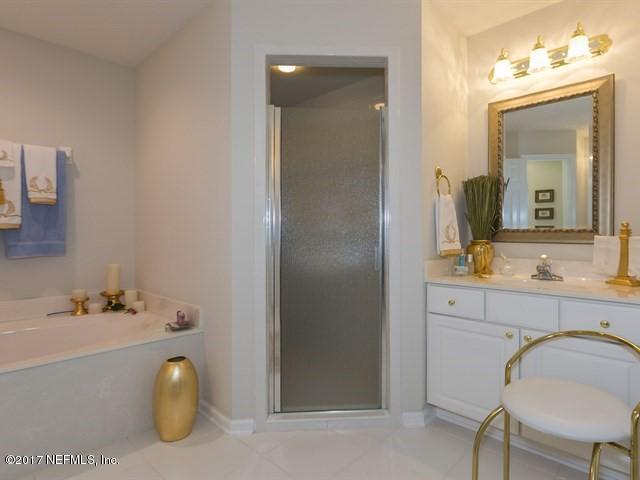 1204 Ribbon Road St. Johns, FL 32259 - Photo 11 of 26 a bathroom with a tub sink and mirror